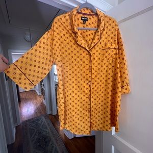 Room Service polyester button up blouse. Size L.